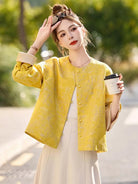 Yellow jacquard tang suit featuring round collar, delicate hem drape and comfortable wide-sleeve design for women
