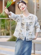 Elegant modern Tang jacket for women with embroidery, jacquard fabric, and traditional frog button details