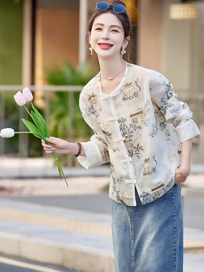 Elegant modern Tang jacket for women with embroidery, jacquard fabric, and traditional frog button details