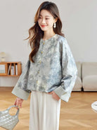 Elegant Tangzhuang jacket for women with jacquard fabric, classic pankou buttons, and modern Chinese vintage-inspired design