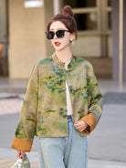 Modern Tangzhuang jacket for women featuring elegant prints, short design, and refined Chinese traditional craftsmanship.