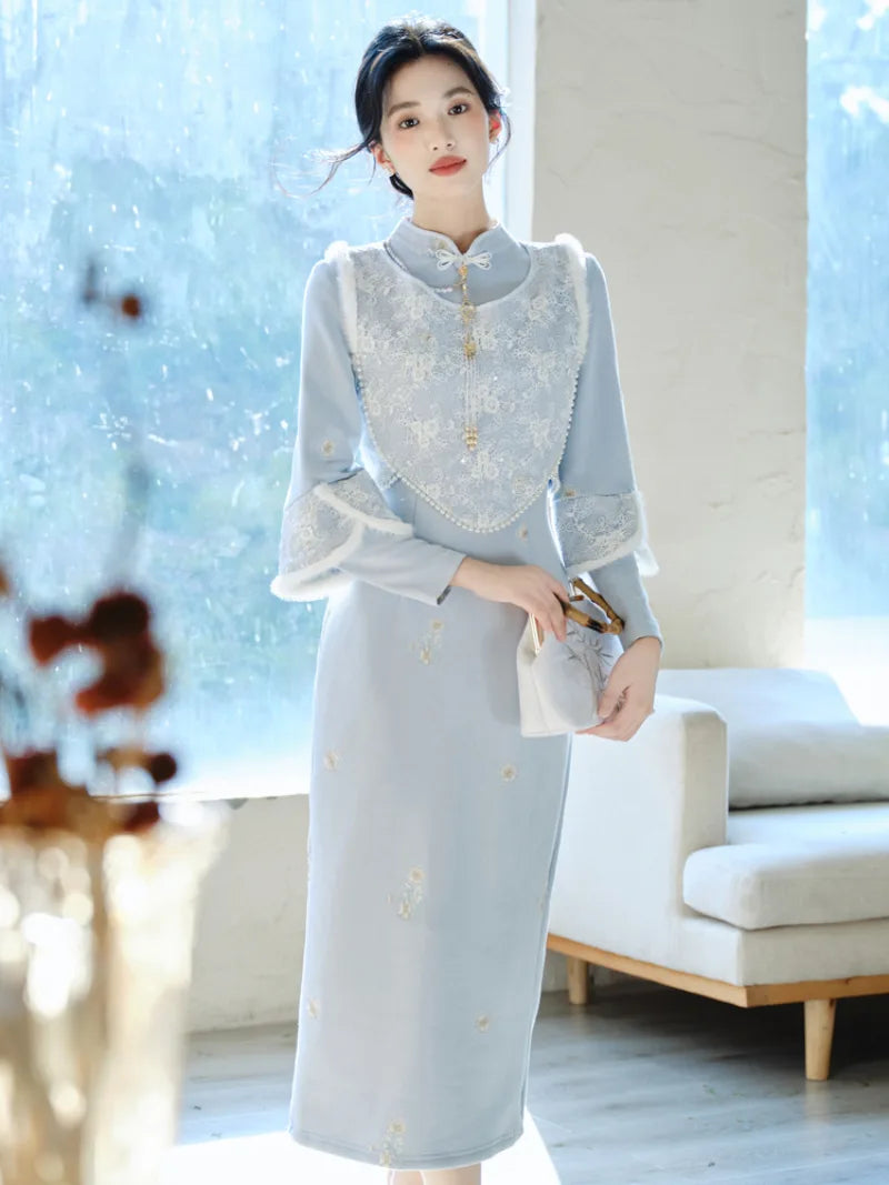 Thickened winter qipao in soft blue with fleece lining and matching vest for warm elegant seasonal wear