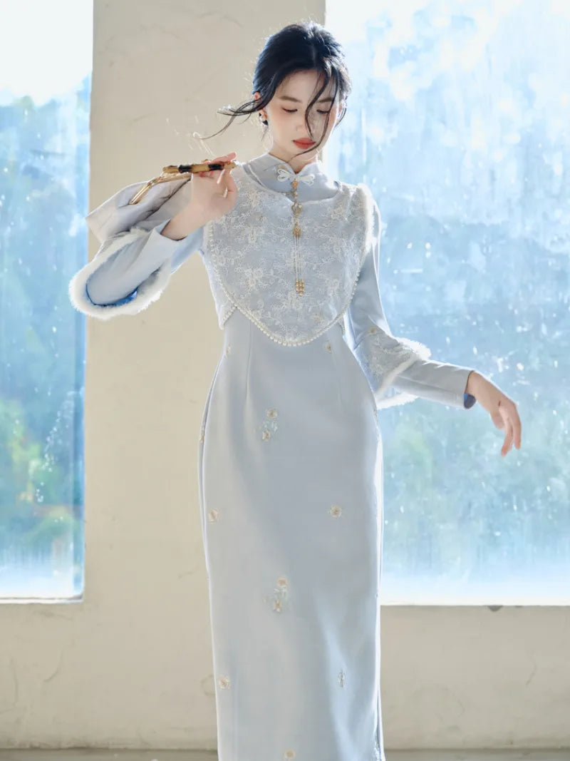 Thickened winter qipao in soft blue with fleece lining and matching vest for warm elegant seasonal wear