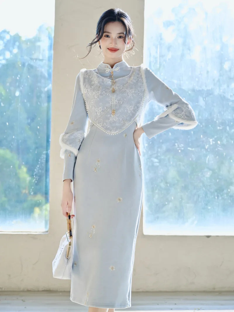 Thickened winter qipao in soft blue with fleece lining and matching vest for warm elegant seasonal wear