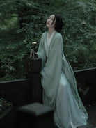 Elegant Wei Jin inspired hanfu outfit with long sleeves and traditional layered design