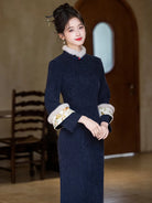 Winter cheongsam dress featuring thickened lining and a stylish vest for warmth and refinement