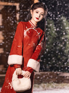 Warm winter cheongsam dress in embroidered red suede with mandarin collar and elegant side-slit design