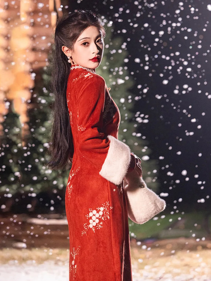 Warm winter cheongsam dress in embroidered red suede with mandarin collar and elegant side-slit design
