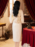 Winter Chinese dress with fleece-lined qipao and elegant vest design for festive occasions